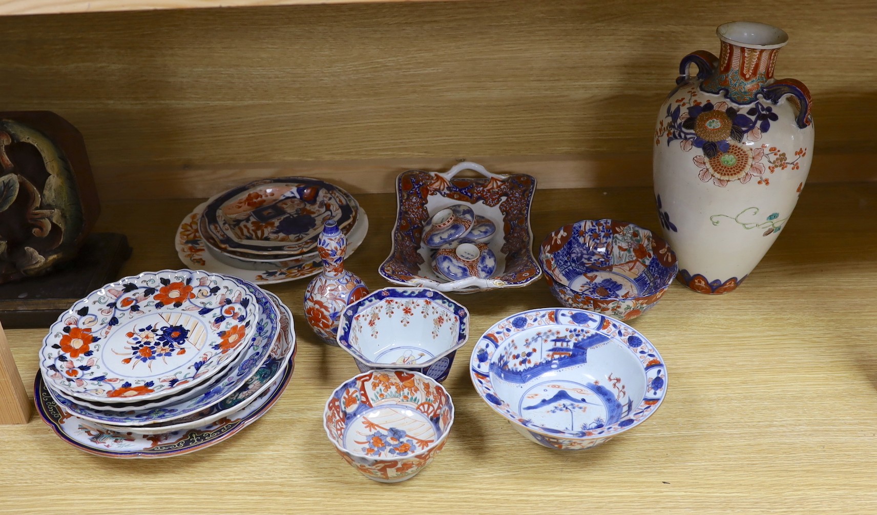 A Japanese Imari two handled vase, a Kangxi Imari bowl a/f and a collection of similar Japanese and continental ceramics